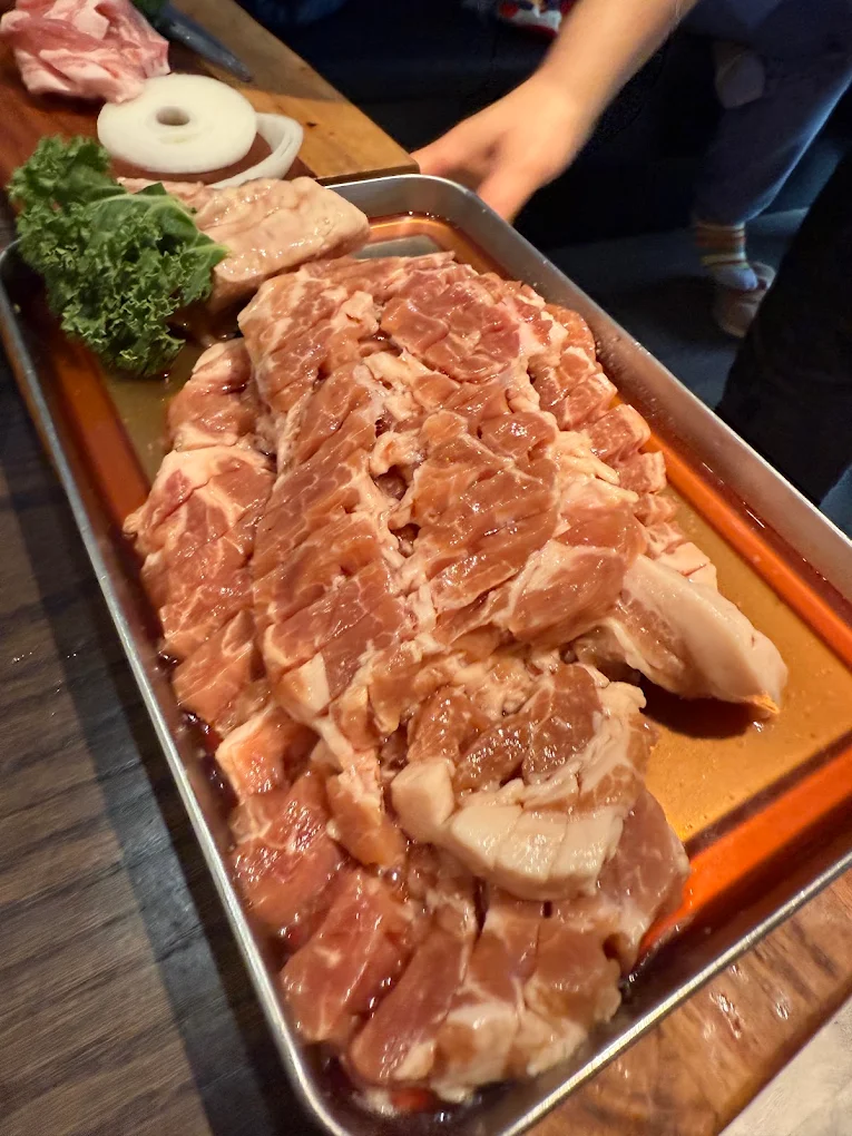 Tray of marinated pork ready for the grill at Piggy Ssonday